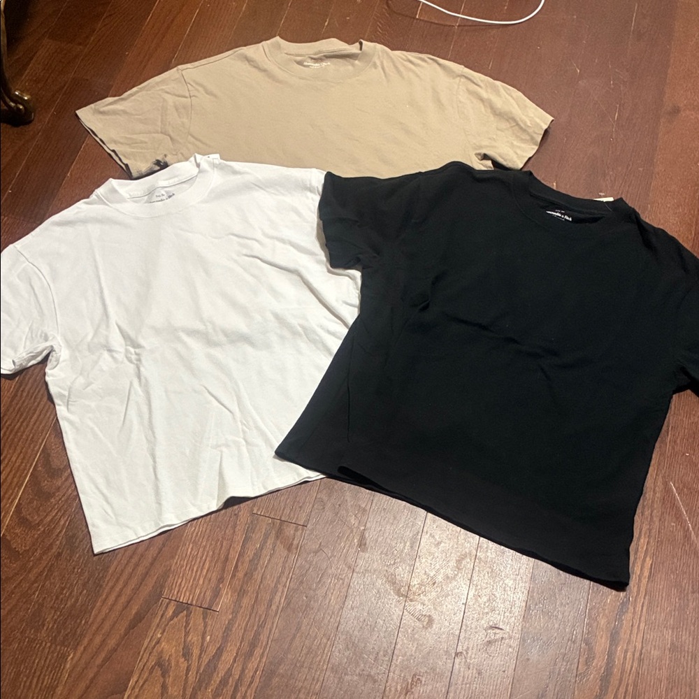 Set of Three T-Shirts in Black, White, and Tan